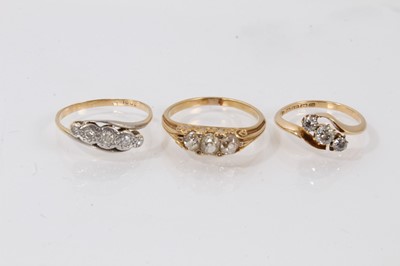 Lot 802 - Victorian diamond three stone ring in 18ct gold setting, together with two other 18ct gold and diamond rings (3)