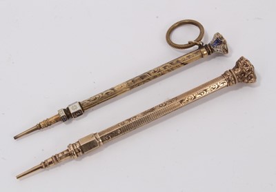 Lot 1002 - Fine quality Victorian enamelled propelling pencil, with heraldic engraved hardstone seal to the terminal, 10cm long, together with another of similar quality