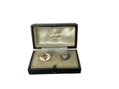 Lot 1248 - Pair of contemporary silver cufflinks of oval form mounted with fox masks, in leather case