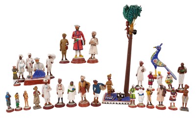 Lot 1018 - Good collection of late 19th/early 20th century Indian painted terracotta figures, comprising approximately 30 figures of various sizes, depicting various tradespeople and castes, many titled to...