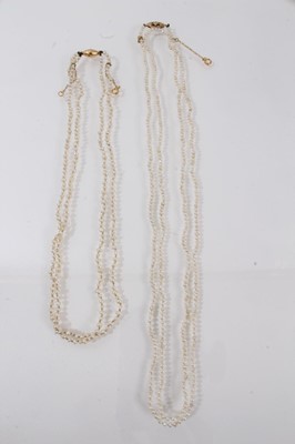 Lot 655 - Antique seed pearl two-strand necklace on a gold clasp, 42cm, together with a long string of seed pearls on a gold clasp, 112cm, both not tested for natural origin (2)