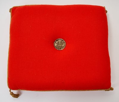 Lot 114 - The Investiture of H.R.H. Prince Charles as Prince of Wales 1969, scarce red Investiture cushion with P.O.W. feather crest badge to centre and bullion cord border