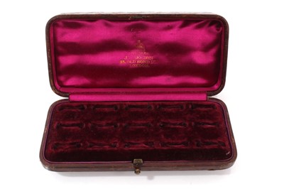 Lot 692 - Late Victorian brown leather ring box retailed by J.W. Benson, London.