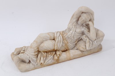 Lot 1057 - Antique carved alabaster figure of a reclining classical maiden, 30cm long