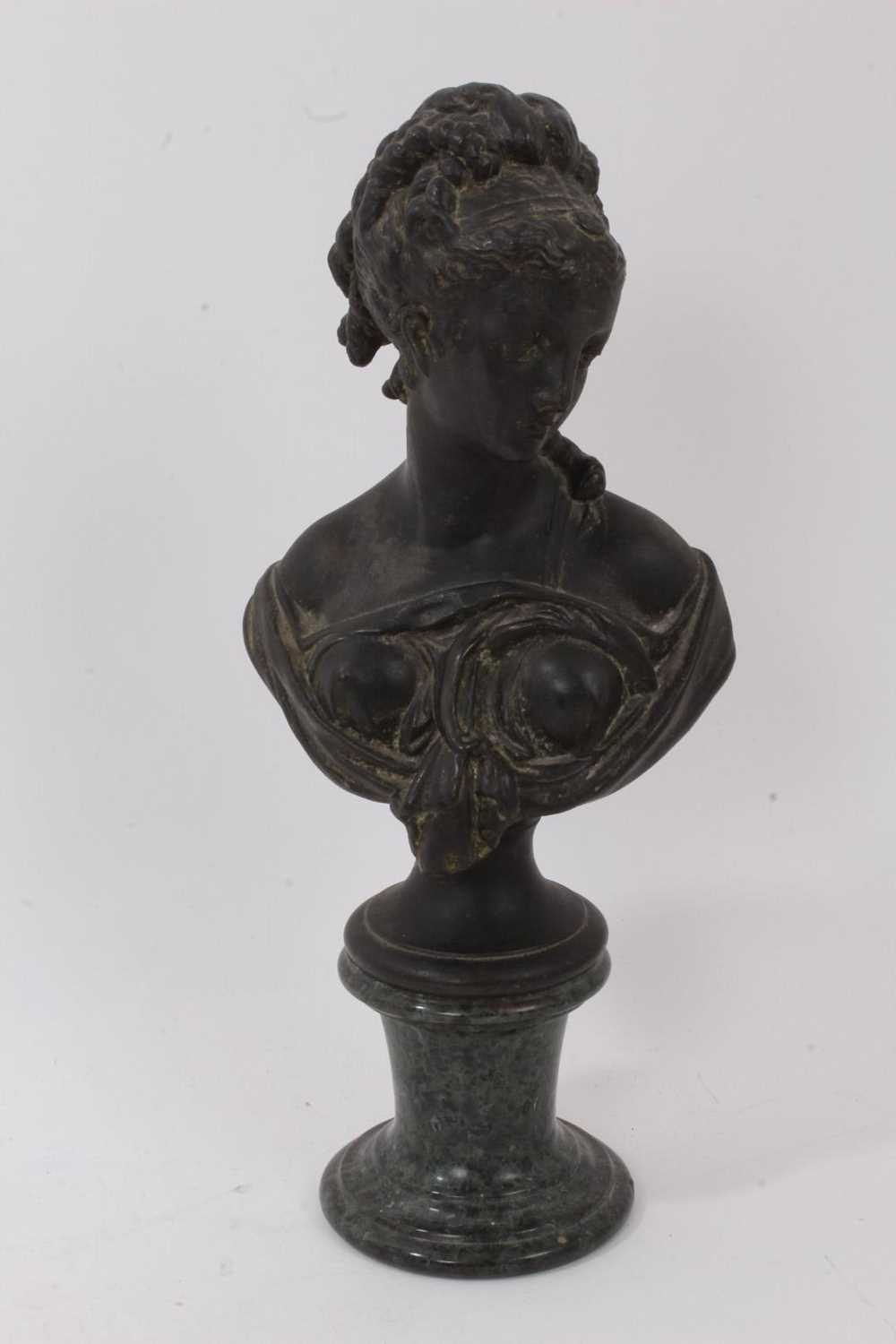 Lot 1058 - 19th century continental classical bronze bust, of a demure female, raised on serpentine marble socle, total height 29cm