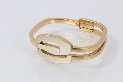 Lot 723 - Italian 18ct white and yellow gold hinged bangle