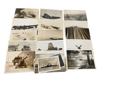 Lot 732 - Collection of thirty three Second World War official press photographs, to include aircraft and ships (33)