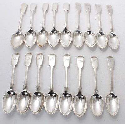 Lot 414 - Thirteen Victorian silver Fiddle pattern dessert spoons, twelve with engraved initials