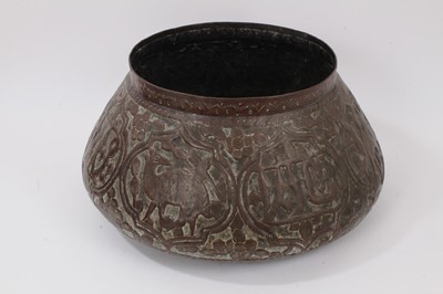 Lot 1107 - Antique Islamic copper embossed vessel