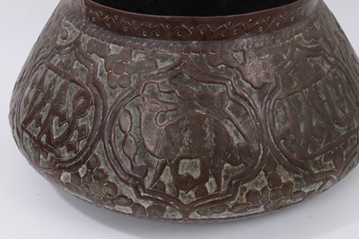 Lot 1107 - Antique Islamic copper embossed vessel