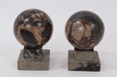 Lot 1105 - Pair of Grand Tour specimen marble spheres, on marble stands