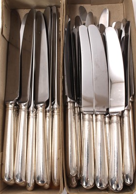 Lot 411 - Composite set of twelve dinner knives with silver handles and other dessert knives