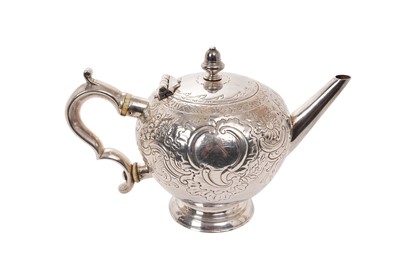 Lot 523 - George II Scottish silver bullet teapot with later chased decoration and scroll handle with ivory insulators, (Edinburgh 1723), maker 'A E', 21ozs, 23cm from handle to spout.