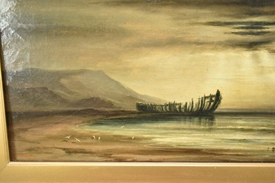 Lot 1432 - Sarah Louise Kilpack (1839 - 1909) oil on canvas - A Coastal Scene with a beached wooden hulk on the tide line, signed, 26cm x 54cm, framed