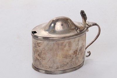 Lot 529 - George III silver mustard pot of oval form with two bands of reeded decoration, hinged lid and blue glass liner to interior, (London 1791), maker Peter & Ann Bateman, 3ozs, 9cm in height