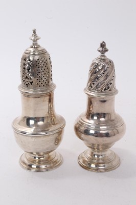 Lot 532 - George II silver caster of baluster form with pierced slip in cover, (London 1741), together with another similar George II silver caster, (London 1750) all at 13ozs, the larger 17cm in height (2)