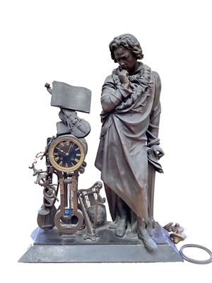 Lot 905 - Impressive Late 19th century French bronzed metal mantel clock mounted with figure of Beethoven, trophy of musical instruments, and striking cylinder movement on slate base 77cm high