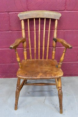 Lot 1643 - Victorian elm and beech open armchair, with blacksmith repair