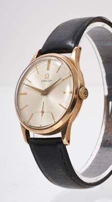 Lot 869 - 1950s Omega 9ct gold wristwatch with 17 jewel mechanical 266 calibre movement numbered 14386234, the circular brushed satin dial with gold baton hour markers and subsidiary seconds, in a circular 9...