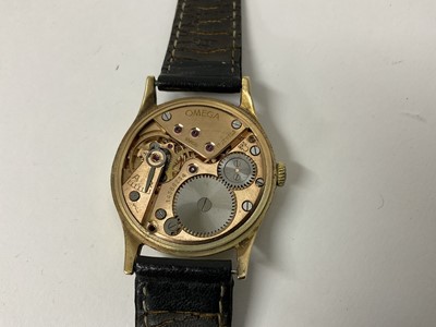 Lot 869 - 1950s Omega 9ct gold wristwatch with 17 jewel mechanical 266 calibre movement numbered 14386234, the circular brushed satin dial with gold baton hour markers and subsidiary seconds, in a circular 9...