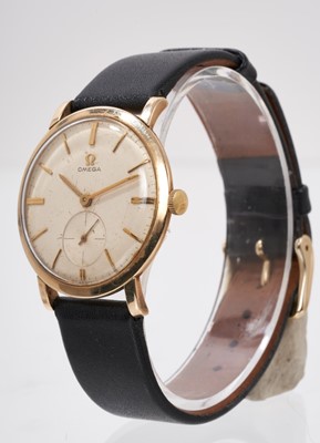 Lot 870 - 1960s Omega 9ct gold wristwatch with 17 jewel mechanical 510 calibre movement numbered 16438769, the circular cream dial with gold baton hour markers and subsidiary seconds, in a circular 9ct gold...