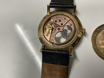 Lot 870 - 1960s Omega 9ct gold wristwatch with 17 jewel mechanical 510 calibre movement numbered 16438769, the circular cream dial with gold baton hour markers and subsidiary seconds, in a circular 9ct gold...