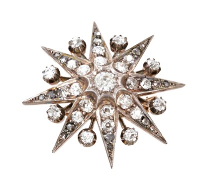 Lot 848 - A fine Victorian diamond star pendant/brooch with old cut diamonds in silver and gold setting with pendant loop to the reverse and a detachable gold brooch fitting, estimated total diamond weight a...