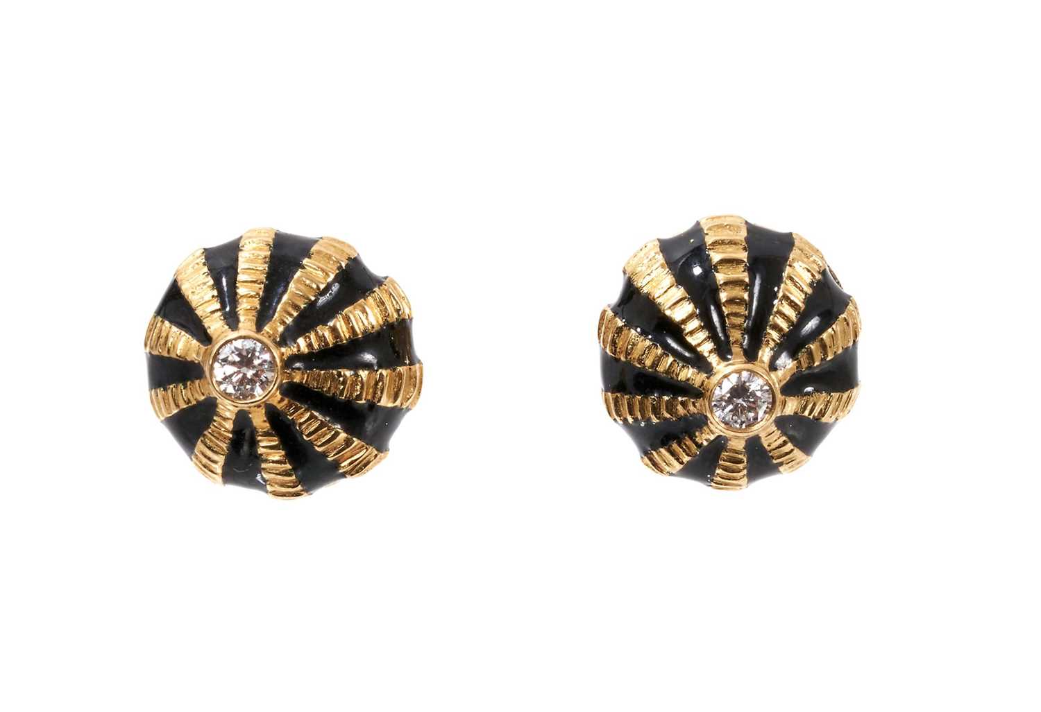 Lot 850 - A pair of gold enamel and diamond earrings, by Jean Schlumberger for Tiffany & Co., the stylized sea anemone shell of oval bombé form with a brilliant cut diamond, rub set to the centre, with r...