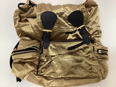 Lot 2077 - Burberry gold silky fabric with black leather and canvas trims, black logo lining and soft dust bag.