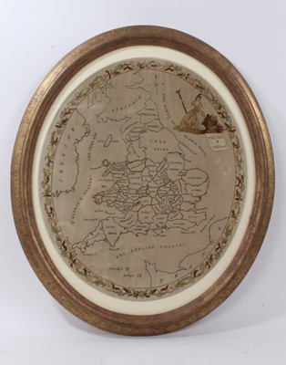 Lot 1131 - Large Regency silk work map sampler, oval, with floral meandering border, approximately 52 x 45cm, glazed frame