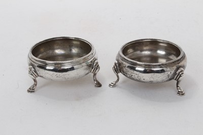 Lot 557 - Pair George III silver salts of cauldron form, with bead borders, on hoof feet (London 1972) Steven Adams. All at approximately 3ozs. 7cm diameter.