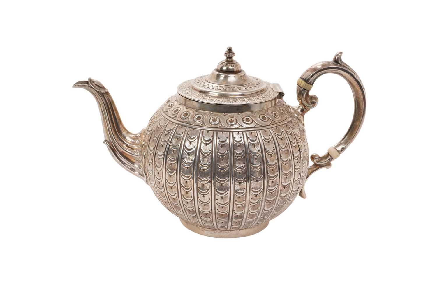 Lot 574 - Victorian silver bullet-shaped teapot with