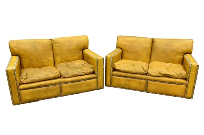 Lot 1624 - Pair of leather studded two-seater sofas