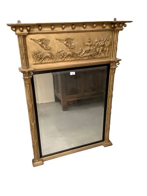 Lot 1626 - Regency gilt pier mirror, with ball mounted cornice and classical relief frieze, rectangular bevelled plate in ebonised slip between Corinthian columns, 117 x 88cm