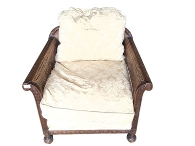 Lot 1216 - Early 20th century carved and caned bergere armchair