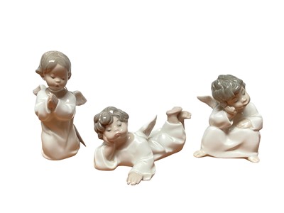 Lot 1156 - Six small Lladro porcelain angels, some playing musical instruments