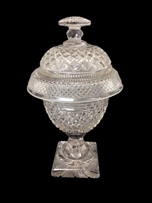 Lot 41 - Group of four 19th century cut glass sweetmeat urns and covers, of varying shapes and sizes, 26cm to 29cm high