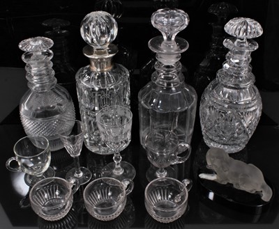 Lot 346 - Group of glassware, including four 19th century cut glass decanters (one with a silver collar), a frosted glass model of a dog, custard cups, etc