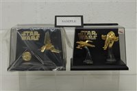 Lot 2710 - Star Wars - four gold plated models - Imperial...