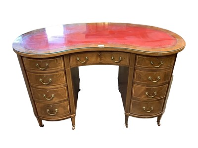 Lot 1650 - Good quality Edwardian inlaid mahogany kidney shaped pedestal desk with tooled red leather top, nine drawers with crossbanded satinwood inlay, brass handles on square taper legs, approximately 122c...