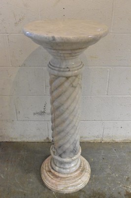 Lot 1693 - Large figured marble column, with circular plateau on spiral twist column, 101cm high