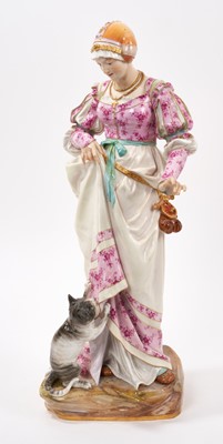 Lot 348 - Large Meissen figure of a lady and her cat, the lady modelled in Renaissance costume on naturalistic plinth base, blue crossed swords, pressnumber 63, 41cm high