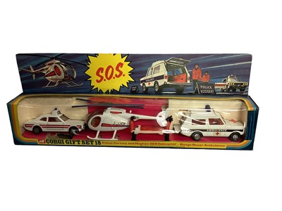 Lot 322 - Corgi  S.O.S. Gift Set 18, Jet Ranger Helicopter No.931, Hughes's Helicopter No.921 & Police Vigilant Range Rover No.461, plus Corgi/Mattel Police Gift Set No.92450, all boxed (4)