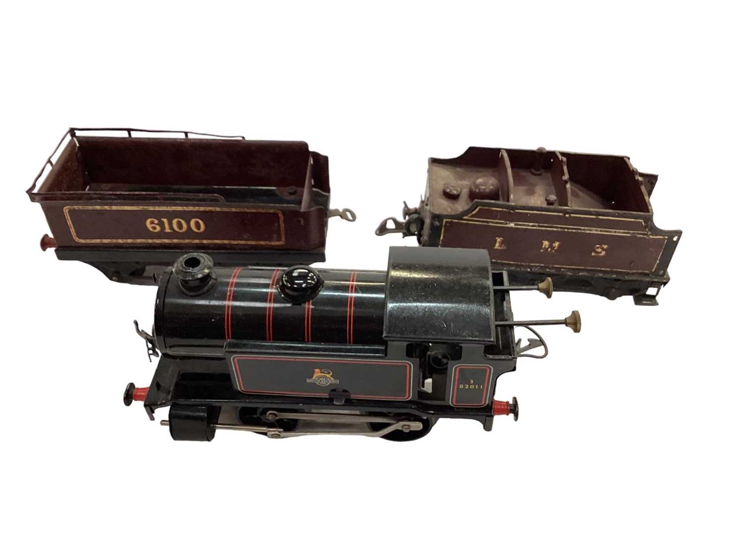 Lot 1869 - Railway Hornby O gauge 0-4-0 locomotive black and red livery boxed tenders (x2). No 50 Gas Cylinder Wagon 42156 also boxed. Plus some unboxed rolling stock and accessories, controller and various t...