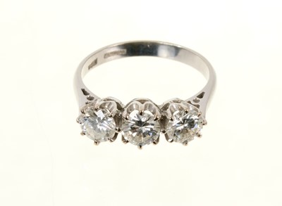 Lot 448 - Diamond three stone ring