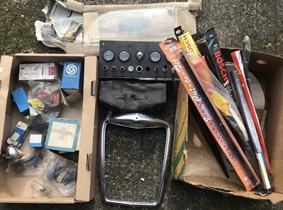 Lot 985 - Crome grill surround (possibly for a Riley), BMC branded vinyl bag and small group of new old stock light lenses and sundry automobilia, together with a box of wiper blades