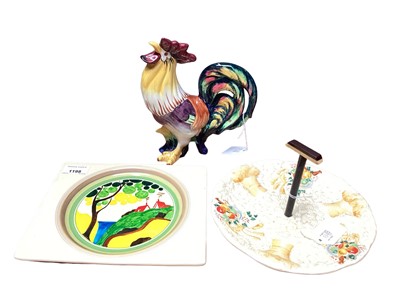 Lot 1198 - Royal Staffordshire Clarice Cliff Biarritz Bizarre square dish, a Clarice Cliff Newport Pottery Celtic Harvest plate, and a Wedgwood cockerel (3)