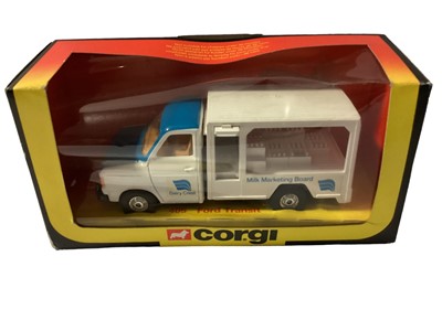 Lot 386 - Corgi diecast Ford Transit Milk Marketing Board No.405, Raygo Rascal 400 No.459 & Mazda B1600 Pick-Up (front window of box damaged) No.493, plus Tronics Yorkie, all boxed (4)