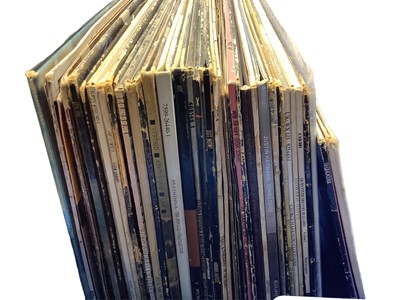 Lot 2211 - Two boxes of LP records, including Saxon, U2, AC/DC, Rainbow, Pretenders, UFO, Moody Blue, Ramones, Stranglers, Scorpions, Dire Straits and Ian Dury - some 12" singles included, conditions vary