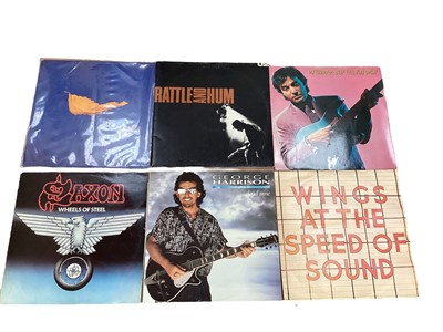 Lot 2211 - Two boxes of LP records, including Saxon, U2, AC/DC, Rainbow, Pretenders, UFO, Moody Blue, Ramones, Stranglers, Scorpions, Dire Straits and Ian Dury - some 12" singles included, conditions vary